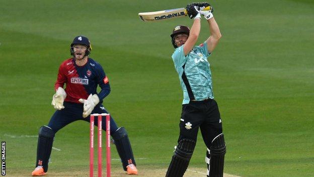 Wicketkeeper Sam Billings watches Jamie Overton batting