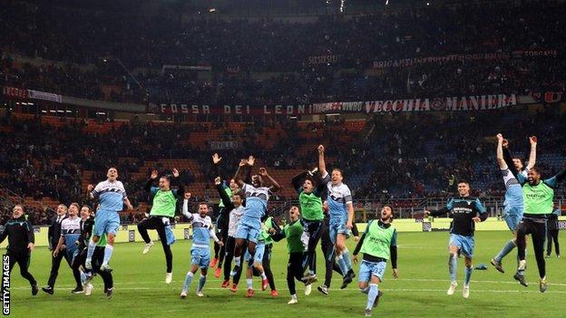 Lazio celebrate after their 1-0 win at the San Siro