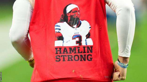 Kansas City Chiefs quarterback Patrick Mahomes wears a custom red top with 'Hamlin strong' on in support of Buffalo Bills player Damar Hamlin
