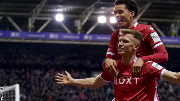 Nottingham Forest's Sam Surridge celebrates scoring his sides first goal against Huddersfield in the FA Cup with team-mate Brennan Johnson