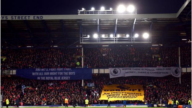 Protest banners at Goodison Park