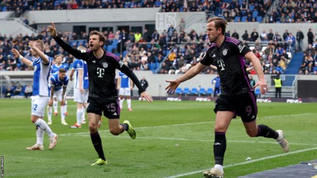 Harry Kane celebrates scoring against Darmstadt