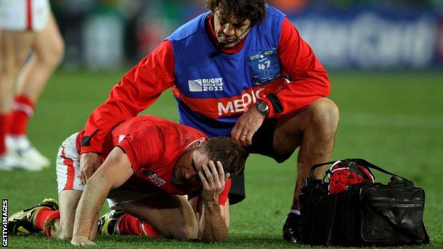 Shane Williams receives treatment for an injury