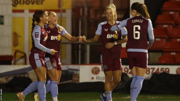 Adriana Leon of Aston Villa celebrates with team mates