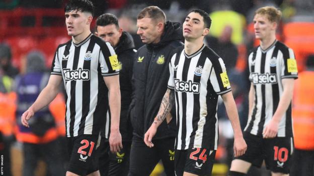 Newcastle players look frustrated after losing to Liverpool