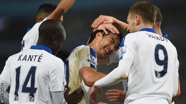 Shinji Okazaki is congratulated after scoring Leicester's opener against Aston Villa