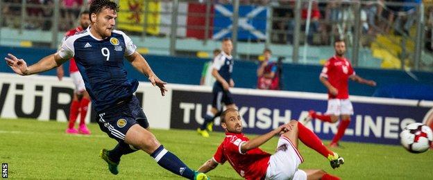 Chris Martin was on target against Malta but the results against the minnows will be discarded