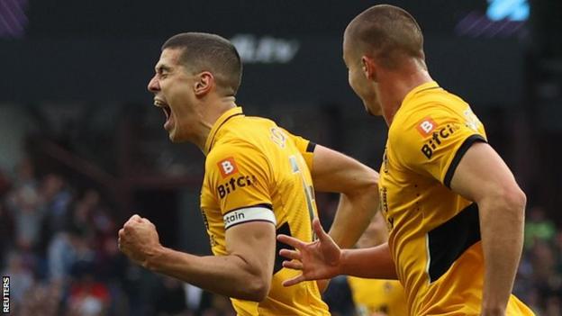 Wolves captain Conor Coady celebrates scoring for Wolves against Aston Villa