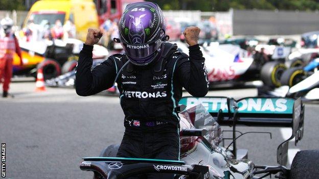 Lewis Hamilton celebrates winning the Spanish Grand Prix