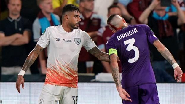 West Ham defender Emerson checks on Cristiano Biraghi