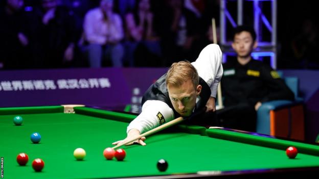 Judd Trump playing at the Wuhan Open