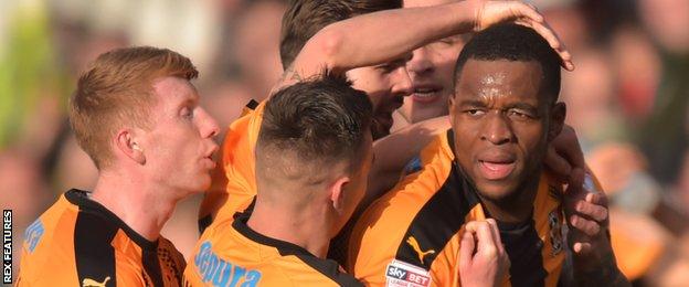 Cambridge United celebrate a goal by Uche Ikpeazu (right)