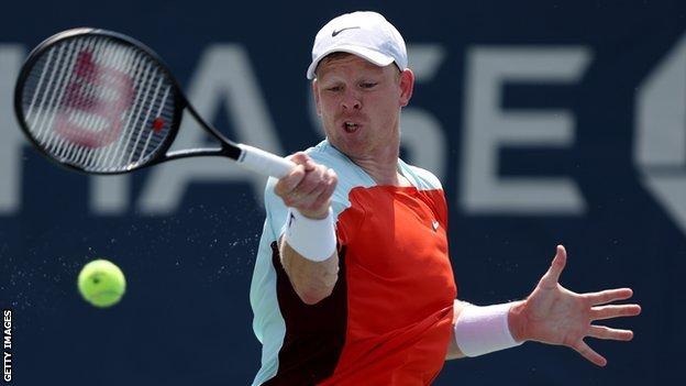 Kyle Edmund hits a return in his 2022 US Open match against Casper Ruud