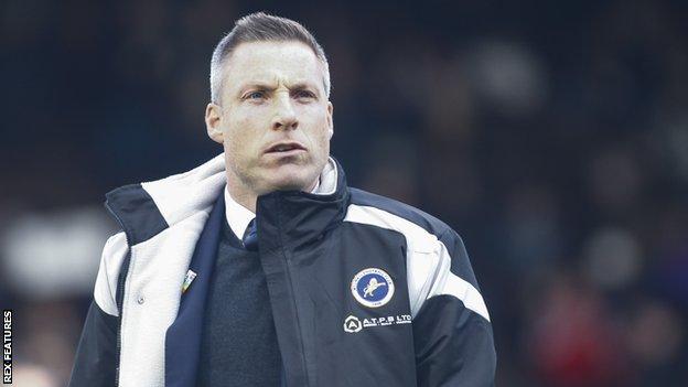 Millwall manager Neil Harris watches on from the sidelines