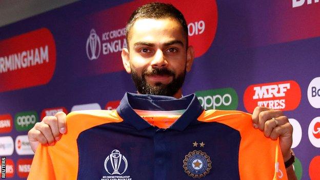 Virat Kohli shows off India's new 'away' kit
