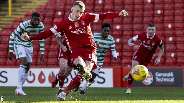 Lewis Ferguson scores a penalty against Celtic