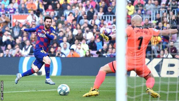Lionel Messi scores