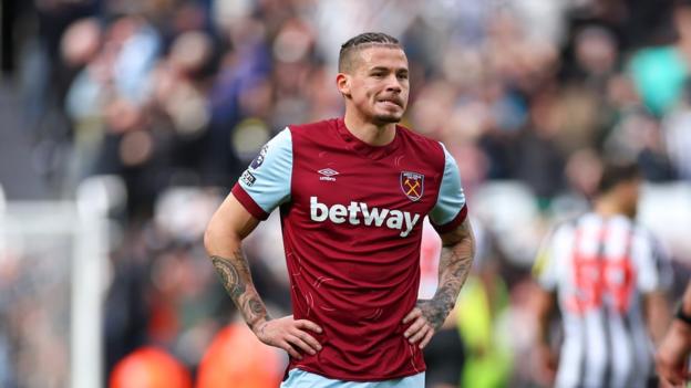 Kalvin Phillips looks on