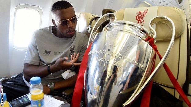 Daniel Sturridge on the plane home with the Champions League trophy after Liverpool won the 2019 final