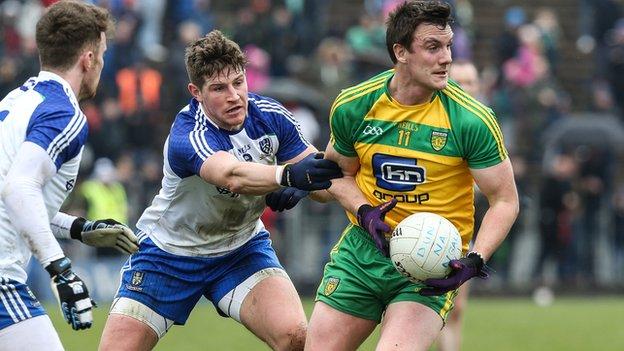 Monghan's Darren Hughes gets to grips with Donegal opponent Leo McLoone