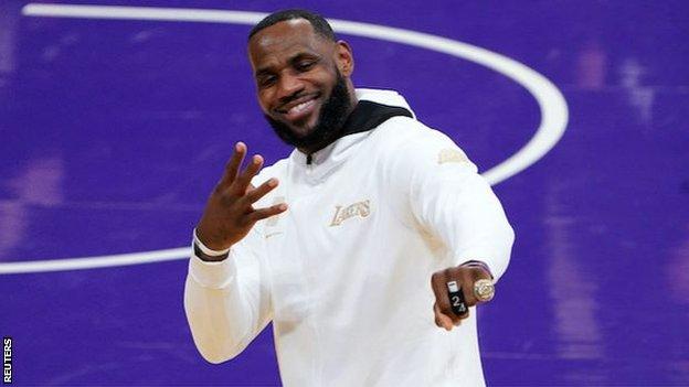 LeBron James shows off his championship ring