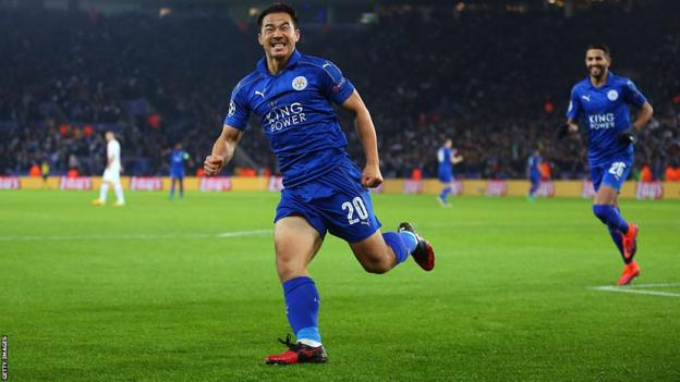 Shinji Okazaki celebrates scoring a goal for Leicester
