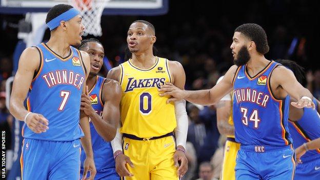 Los Angeles Lakers guard Russell Westbrook (centre) argues with Oklahoma City Thunder players