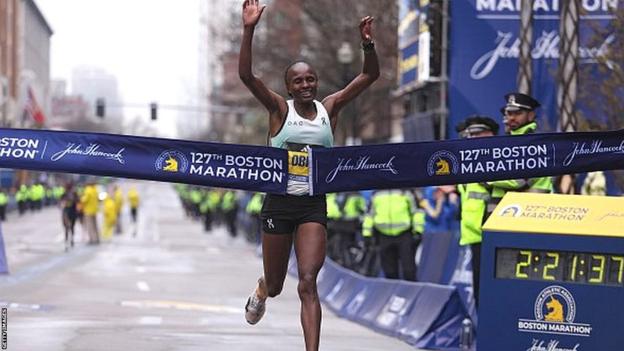 Hellen Obiri's breasts the tape to win the 2023 Boston Marathon