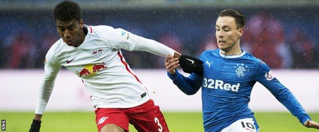 Leipzig's Bernardo battles for the ball against Rangers' Barrie McKay