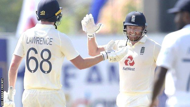 Dan Lawrence and Jonny Bairstow celebrate England's seven-wicket win