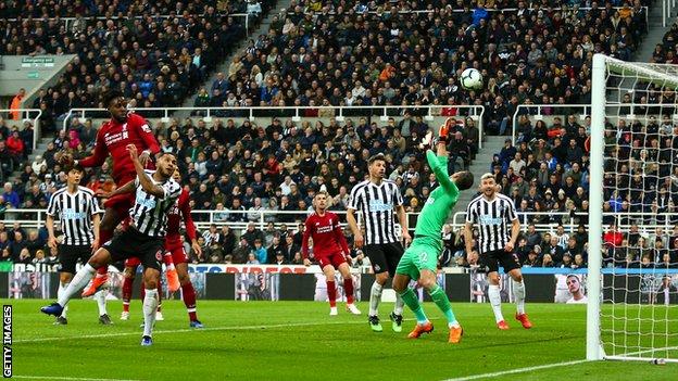 Divock Origi heads in Liverpool's winner against Newcastle