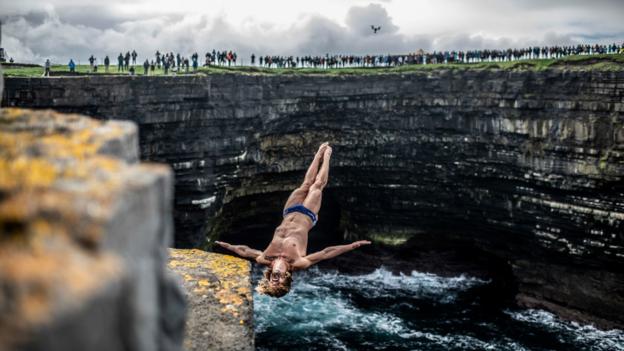  USA's David Colturi dives from the 27.5m rock platform at the Red Bull Cliff Diving World Series in Mayo, Ireland