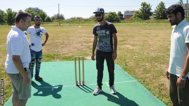 Vlada (far left) oversees the toss with Prince (second from right)