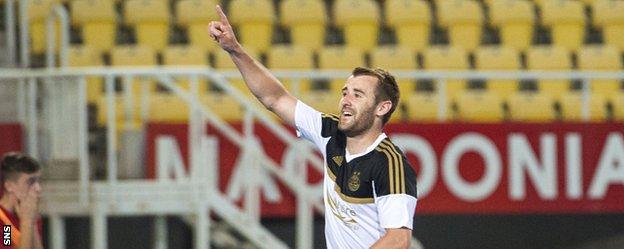 Aberdeen's Niall McGinn celebrates after opening the scoring