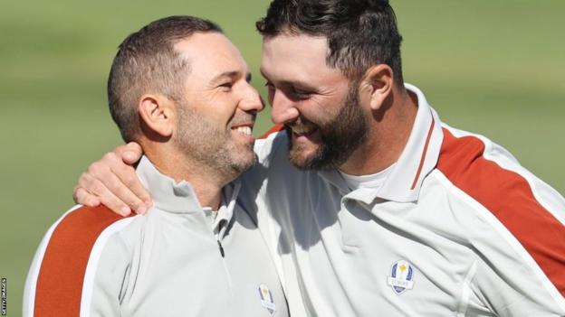 Sergio Garcia and Jon Rahm celebrate winning a foursomes match at the 2021 Ryder Cup