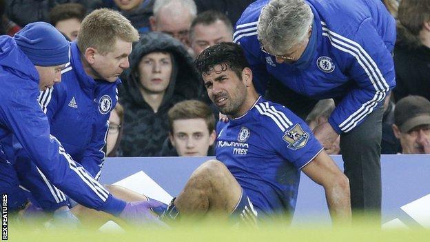 Chelsea striker Diego Costa receives treatment during his side's draw with Everton
