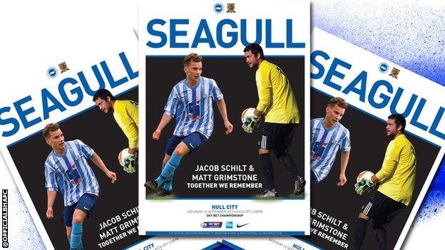 Shoreham air crash victims Jacob Schilt and Matt Grimstone feature on the cover of the match programme for Brighton's Championship match at home to Hull
