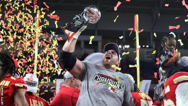 Laurent Duvernay-Tardif celebrates with the Vince Lombardi trophy