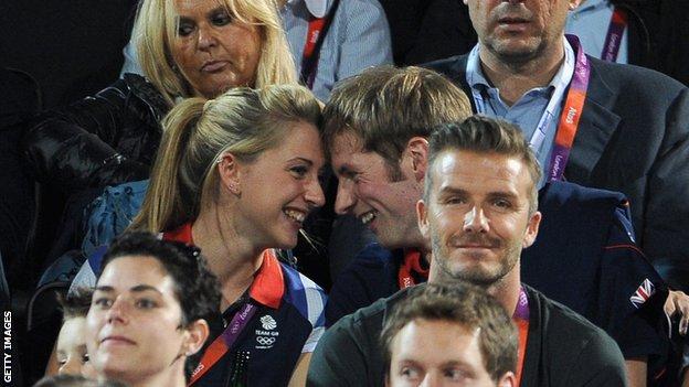 Laura and Jason Kenny look at each other with their foreheads touching