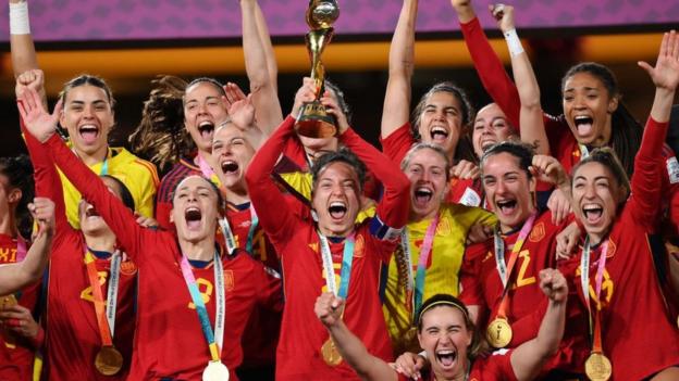 Ivana Andres of Spain lifts the FIFA Women's World Cup Trophy