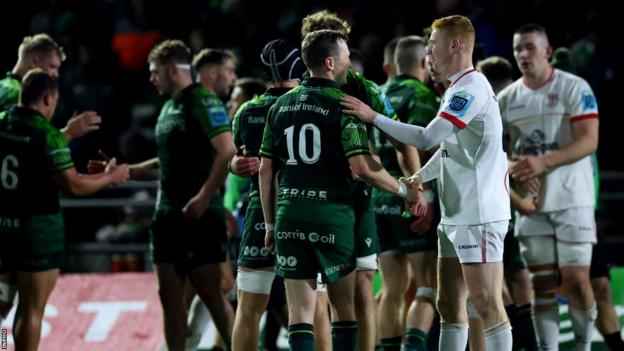 Connacht and Ulster players shake hands