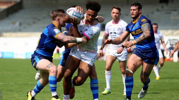 Leon Ruan powers over for a try on his Leeds Rhinos debut against Wakefield to level the scores