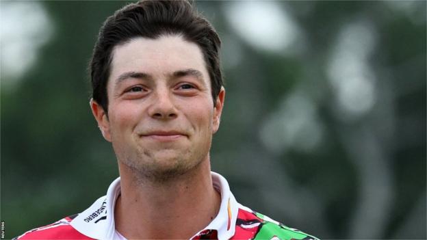 Viktor Hovland smiles at the end of his first round at the 2023 Masters