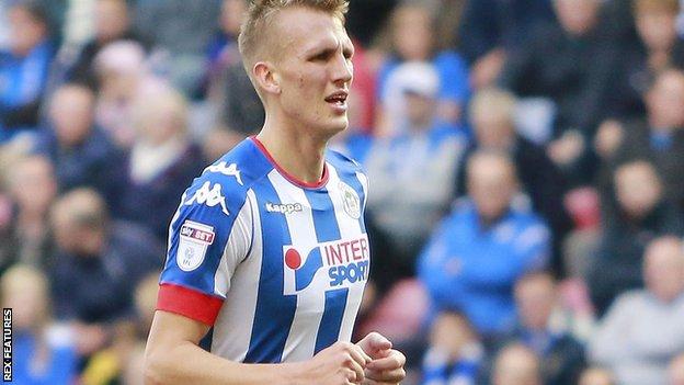 Dan Burn in action for Wigan Athletic