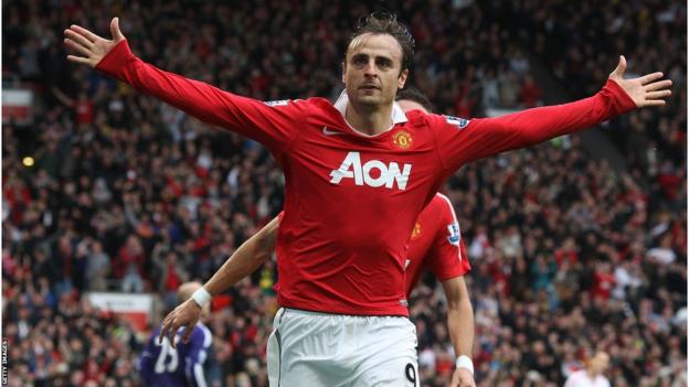 Manchester United striker Dimitar Berbatov scores against Liverpool at Old Trafford