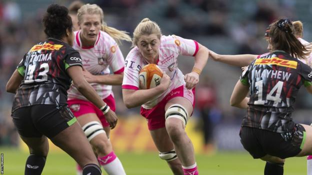 Sam Monaghan (middle) goes for a try for Gloucester-Hartpury women v Saracens