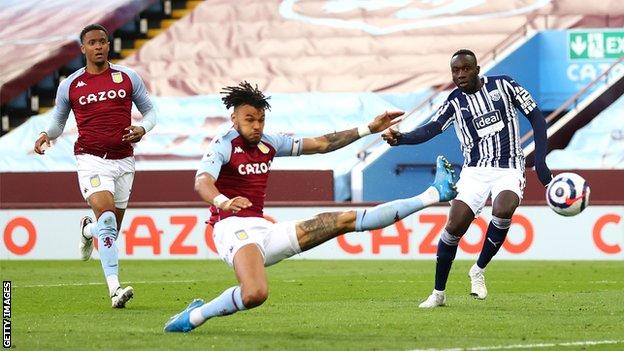 West Brom score a second goal against Aston Villa as Mbaye Diagne's shot is deflected into the net via a deflection off Tyrone Mings