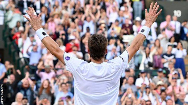 Cameron Norrie celebrates with the Court One crowd