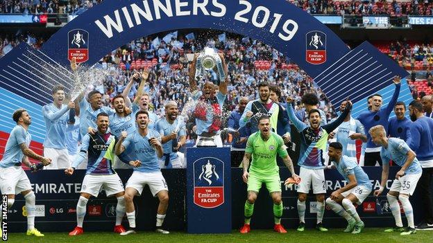 Manchester City celebrate winning the FA Cup