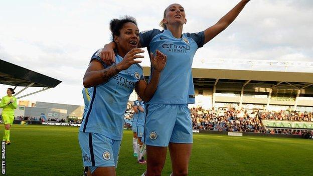 Toni Duggan and Demi Stokes celebrating after winning the 2016 League Cup with Manchester City